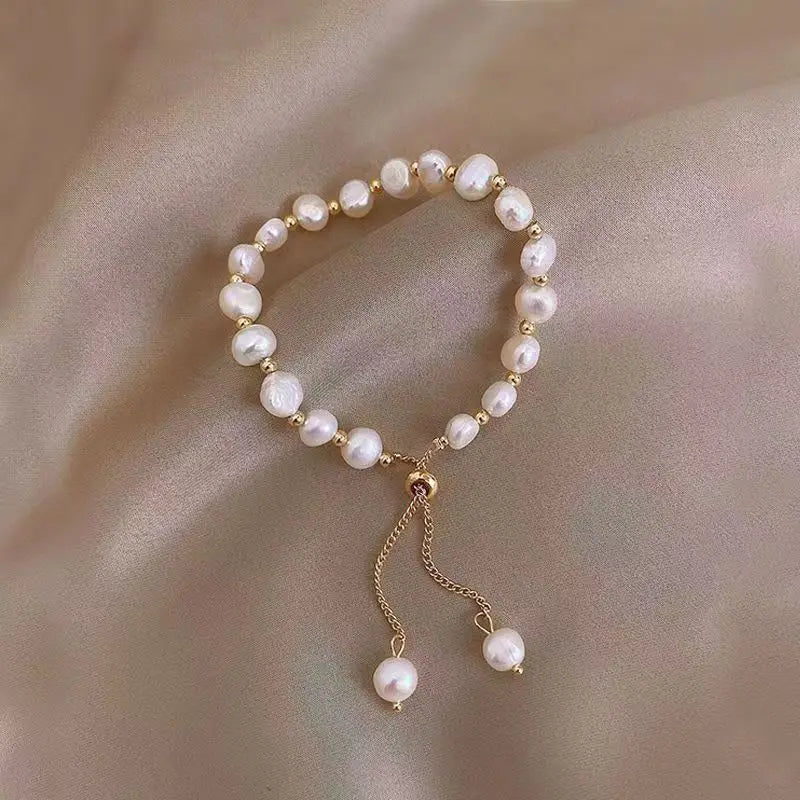 Pearl and Crystal Bracelet with Gold Tassel